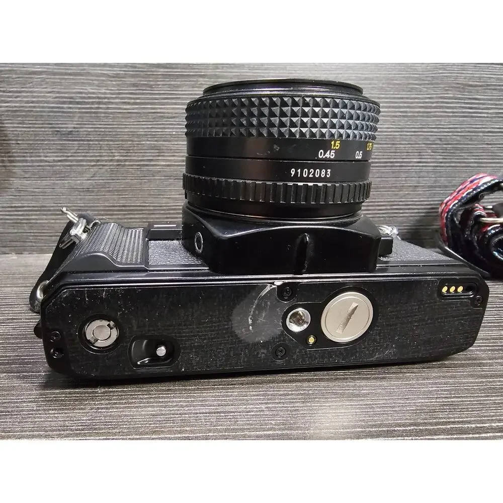 Minolta X-700 35mm Film Camera w/ fast 50mm F1.7 Lens & Flash And Accessories